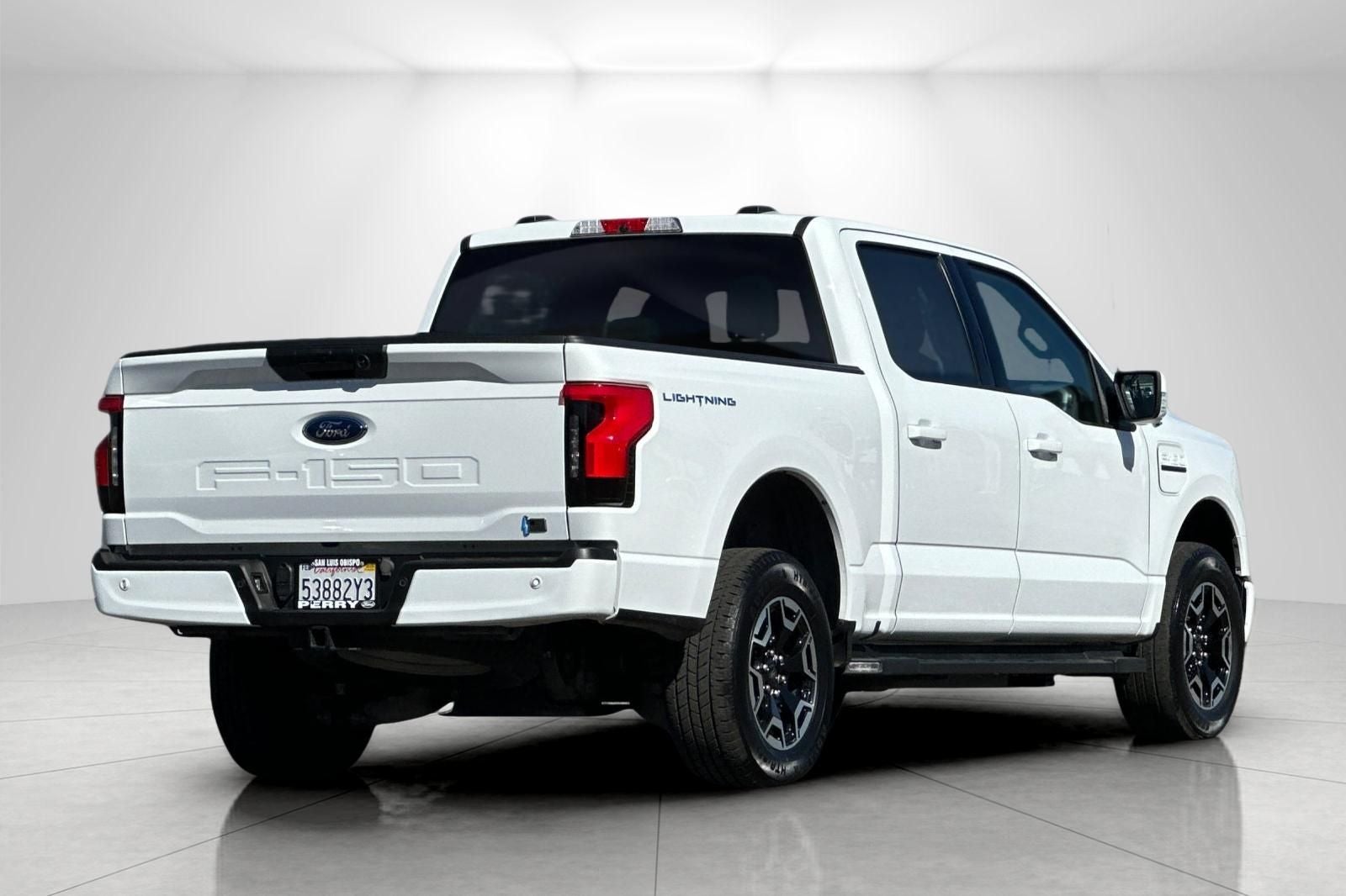 2023 Ford F-150 Lightning — rear three-quarter view