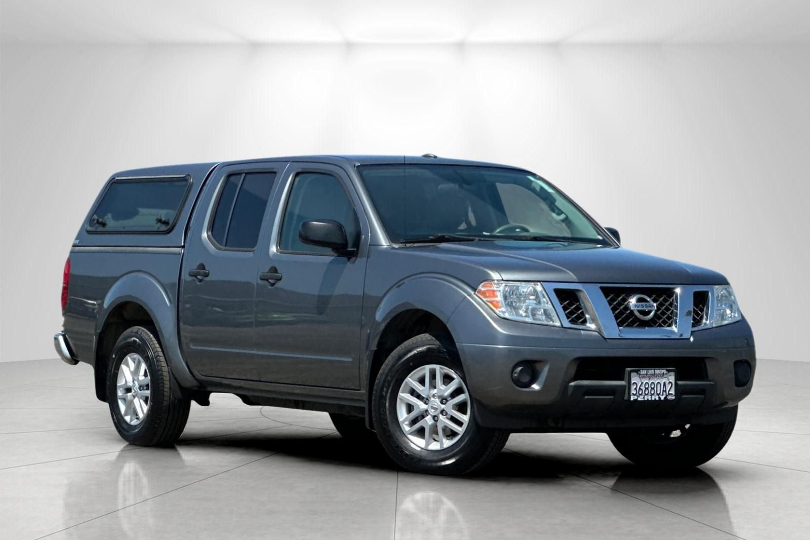 2016 Nissan Frontier SV in Gun Metallic — front three-quarter view