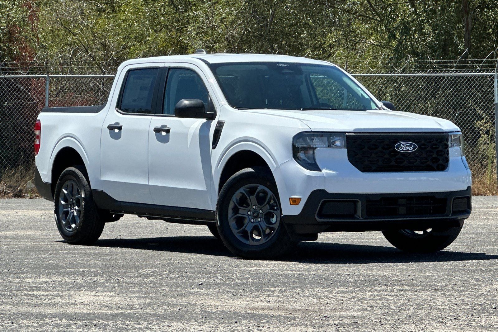 2026 Ford Maverick XLT in Oxford White — front three-quarter view
