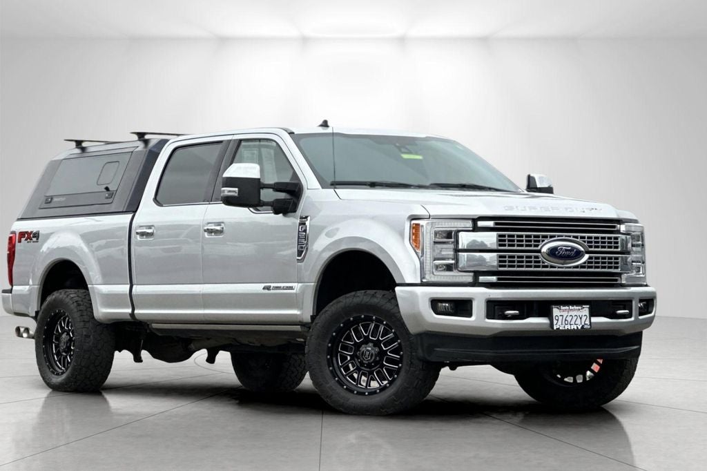 2019 Ford F-250SD Platinum in Ingot Silver — front three-quarter view