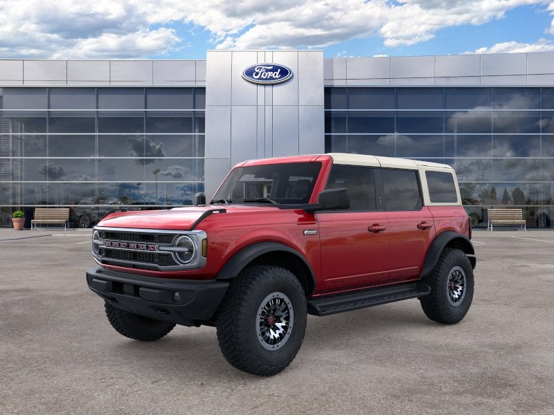 2026 Ford Bronco Outer Banks in Ruby Red Metallic Tinted Clearcoat — front three-quarter view